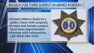Armed robbery suspects crash vehicle during chase; authorities searching for 3rd suspect