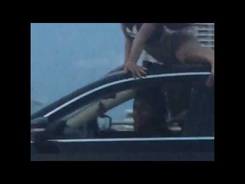 Damn! Woman Twerks On Roof of a Car While Car Is Driving In Miami Highway