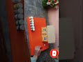 painting of roof of cardboard house