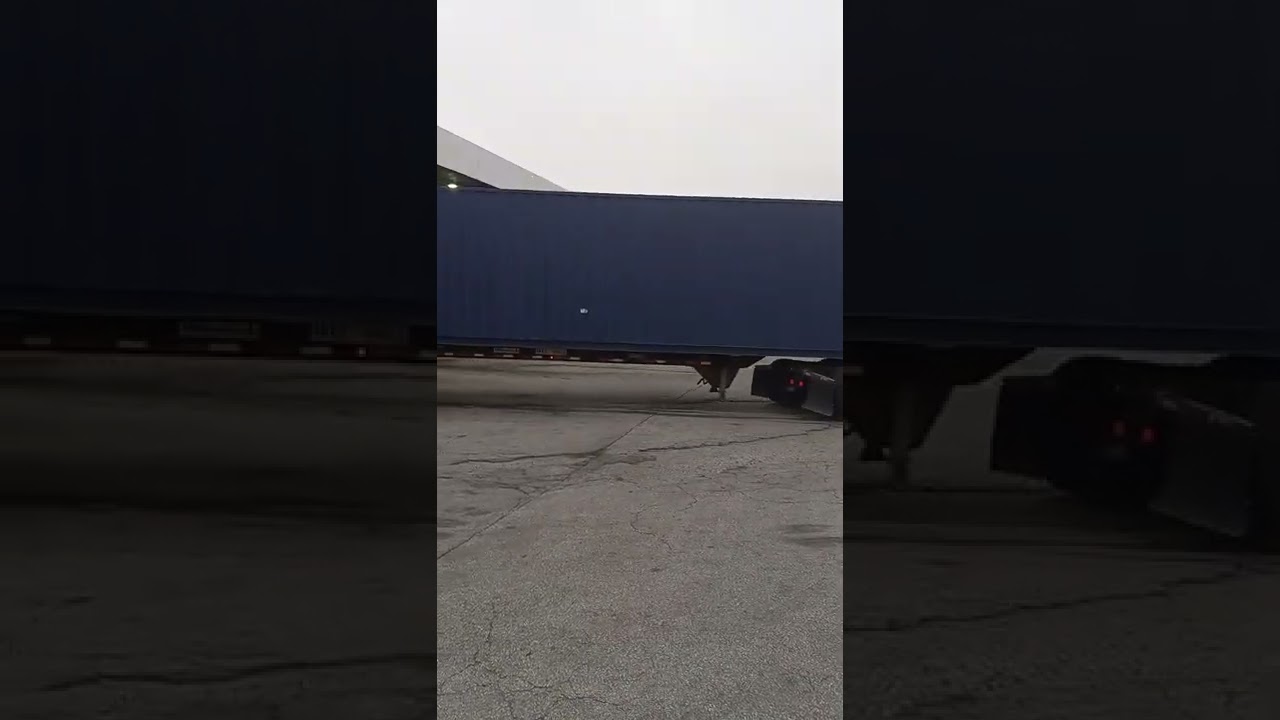 Beautiful two-toned Freightliner Columbia rig red body light Grey  fenders  blue trailer on move AM