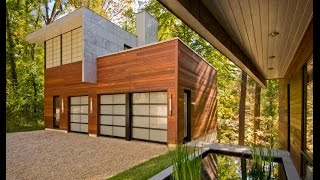 Interior & Exterior Home Design Ideas : Wissioming Residence by Robert Gurney Architect
Interior & Exterior Home Design Ideas : Wissioming Residence by Robert Gurney Architect
The Wissioming Residence is a two-story contemporary home that was designed in 2008 by Robert Gurney Architect.
The house, located in Glen Echo, Maryland is sited on a heavily wooded lot overlooking the Potomac River.
Glen Echo stands as a rare enclave of modern houses, several miles North West of Washington DC.
Wissioming Residence by Robert Gurney Architect:
“The new house occupies the footprint of a pre-existing house in an effort to minimally disturb the site, removing no mature hardwoods in the process. A new swimming pool is suspended twenty feet above grade to further reduce the impact to the steeply sloping site.
In an effort to lessen his dependence on the automobile, the owner/ builder required that his office become part of his residential compound. The office is located on the ground floor of a detached structure separated from the main residence by a reflecting pool. That structure also contains a garage on the first level and a guest suite above. Translucent glass and panels of Kalwall are used to allow the building to serve as a lantern to the main house at night.
Structural pre-cast concrete planks are employed throughout the project in effort to expedite the construction process, span large open areas and to provide the ability to heat the house hydronically. Combined with a 5” concrete slab and terrazzo flooring the structural system provides additional passive heating. Large overhangs on the glazed southern wall and the tree canopy minimize solar gain in the summer.
Wood siding is combined with soft gray terne coated stainless steel and black steel window frames to provide an exterior material palette that fits comfortably in the landscape. Bluestone, gravel and water complete the palette.
Interior materials such as white terrazzo flooring, white oak cabinetry and aluminum compliment the light filled and minimally detailed space. The creation of this atmosphere refocuses one’s attention outward, allowing the owner to reconnect with the inherently picturesque site already preserved through the design.”
Subscribe to our channel : http://www.youtube.com/homeinteriorplus Interior & Exterior Home Design Ideas : Wissioming Residence by Robert Gurney Architect