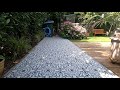 Nicole's turning old concrete gravel pavers into a great Portuguese patio