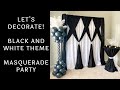 Masquerade party backdrop with feather balloon columns  timelapse