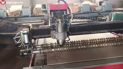 Máy cnc quảng cáo giá rẻ lắp thêm lô tỳ đè vật liệu tại Bình Dương