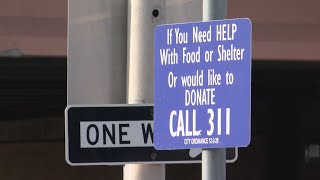 Mayor Keller to replace Berry-era 'call 311' homeless help signs