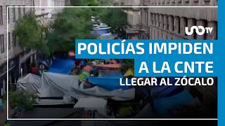 CNTE instala plantón en calle 5 de Mayo tras choque con policías