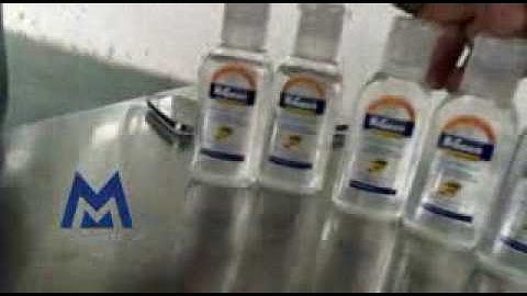 Flat bottle two sides labeling machine