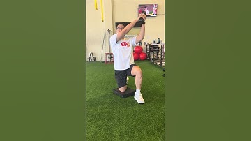 Half kneeling dumbbell chop