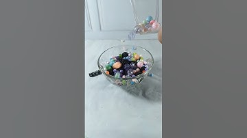Marbles Beads Jump from Glass #reverse #satisfying #shorts