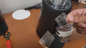 Clean up coffee grinds in DF64 and replace de-clamper