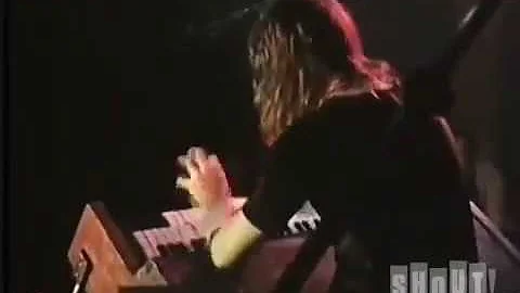 Crazy man destroying a Hammond L100 organ on stage...