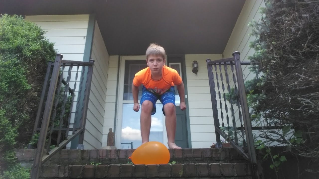 Jumping on a giant water balloon [huge explosion] YouTube