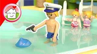 Playmobil Polizei Film - Kommissar Overbeck im Aquapark - Video für Kinder von Familie Hauser