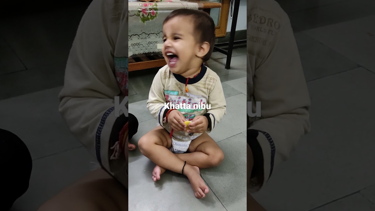 little boy eating lemon first time! 