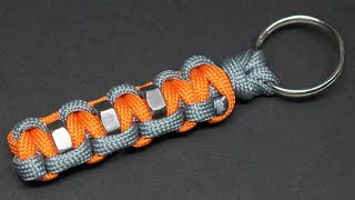 Custom keychain with few paracord, knot cobra and some nuts as materials