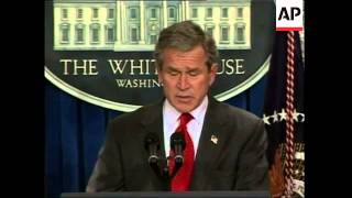 US President announces panel to investigate WMD issue