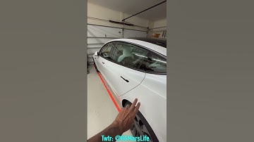 Tap open Tesla charge port