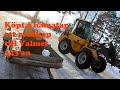 Hämtar redskap å monterar snöblad på hjulingen.