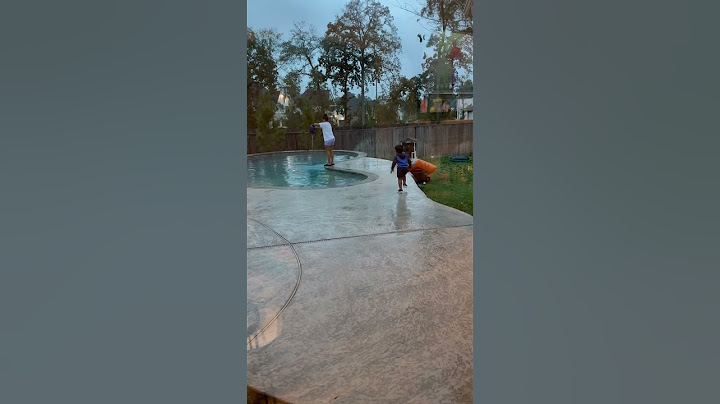 Dad gives son giant lollipop to push mom in the pool #shorts