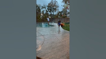Thumbnail of Dad gives son giant lollipop to push mom in the pool #shorts