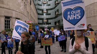 Healthworkers confront BBC as unions finally back 15% pay rise