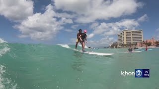 Waikiki surf instructor helps 13yearold adaptive athlete catch first wave