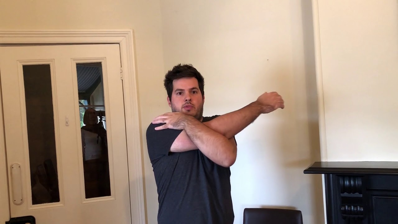 Shoulders stiff? Exercise to stretch the backs of shoulders.