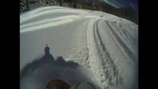 Snowmobile cornice drop