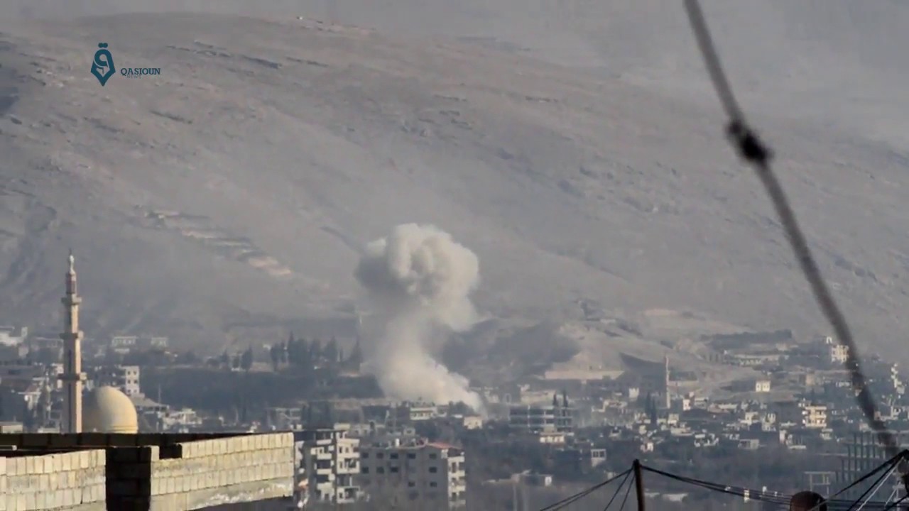 Rif Dimashq: Syrian regime helicopters drop barrel bombs over Wadi Barada villages 22-1-2017
