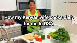 African village girl cooks for American man