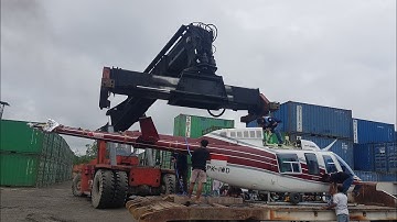 how put helicopter inside container shipment , shipping helicopter inside container