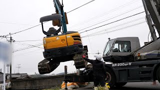 Using a crane to operate heavy machinery and remove 1,500 tons of sediment from the river.