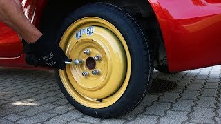 Mitsubishi Lancer - Spare Tire Installation