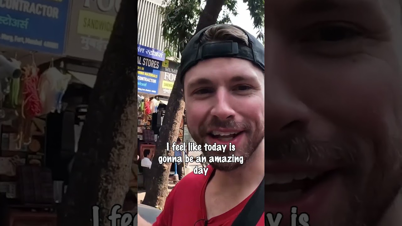 Max McFarlin feeds cow in India 🇮🇳