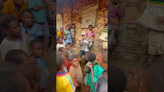 Showing Village Kids a Magic Trick (Papua New Guinea)