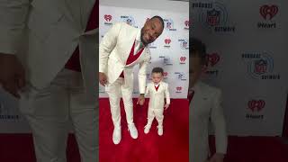 J.K. Dobbins and his son have a matching moment on the NFL Honors red carpet!🥹