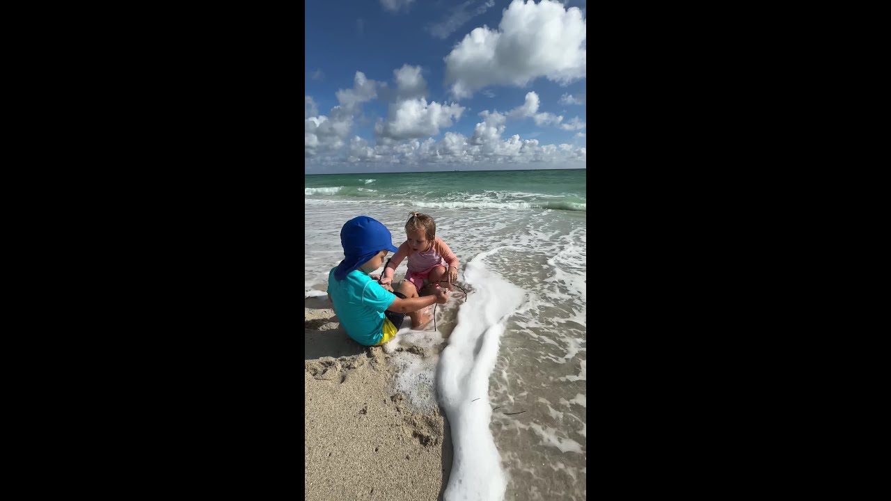 Cute David is playing with Naomi on the beach - YouTube