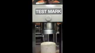 Installing a Breaking Head in a Test Mark Industries Concrete Compression Testing Machine