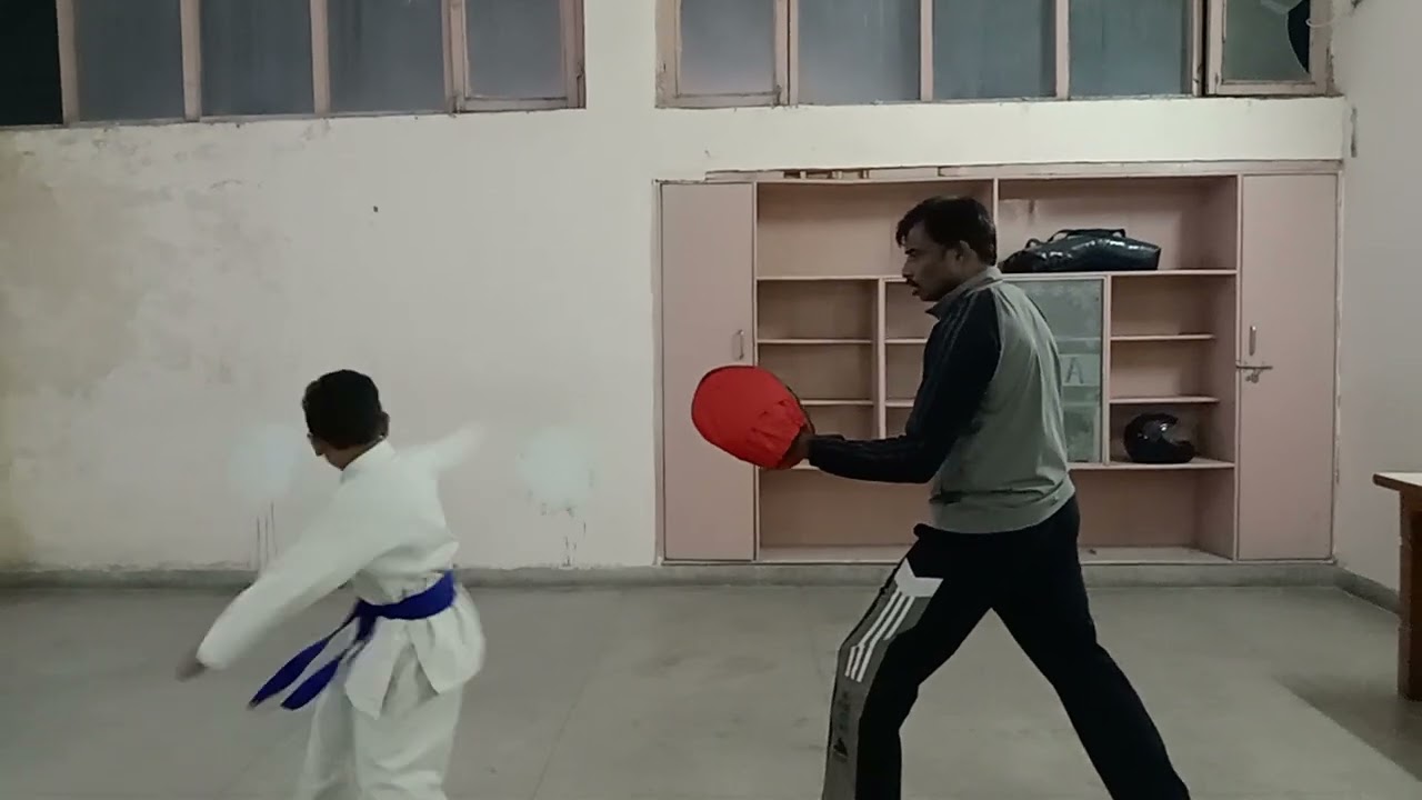 SKM FBD Karate student practice ushiro Mawashi Keri 