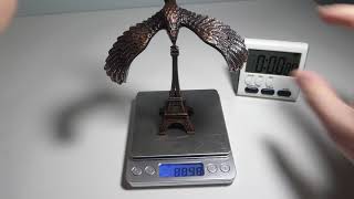 Bronze Balancing Bird. Base 21.34 g. Bird 91.43 g. Balances and Weight Moves for 0:03