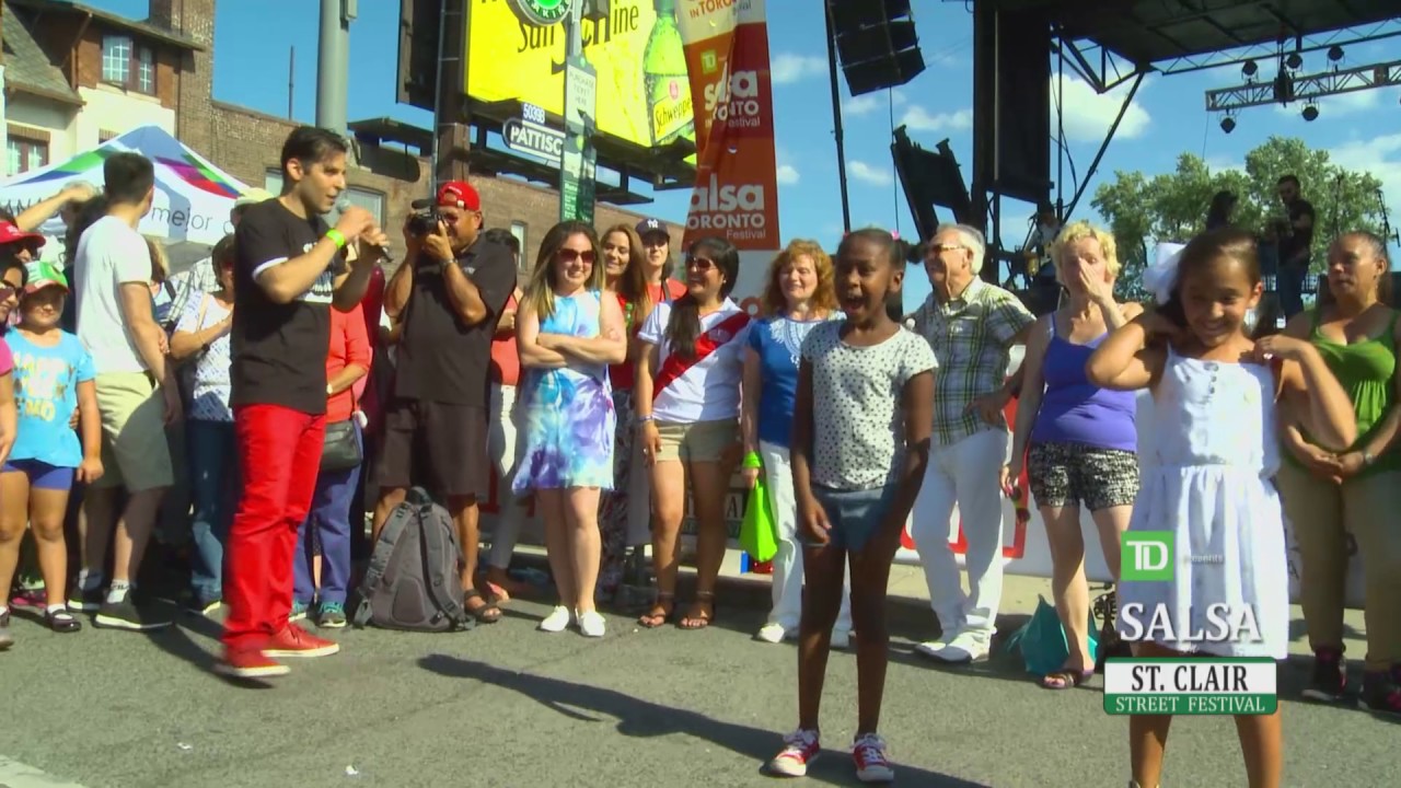 TD Salsa on St.Clair Host teaching Children to Dance