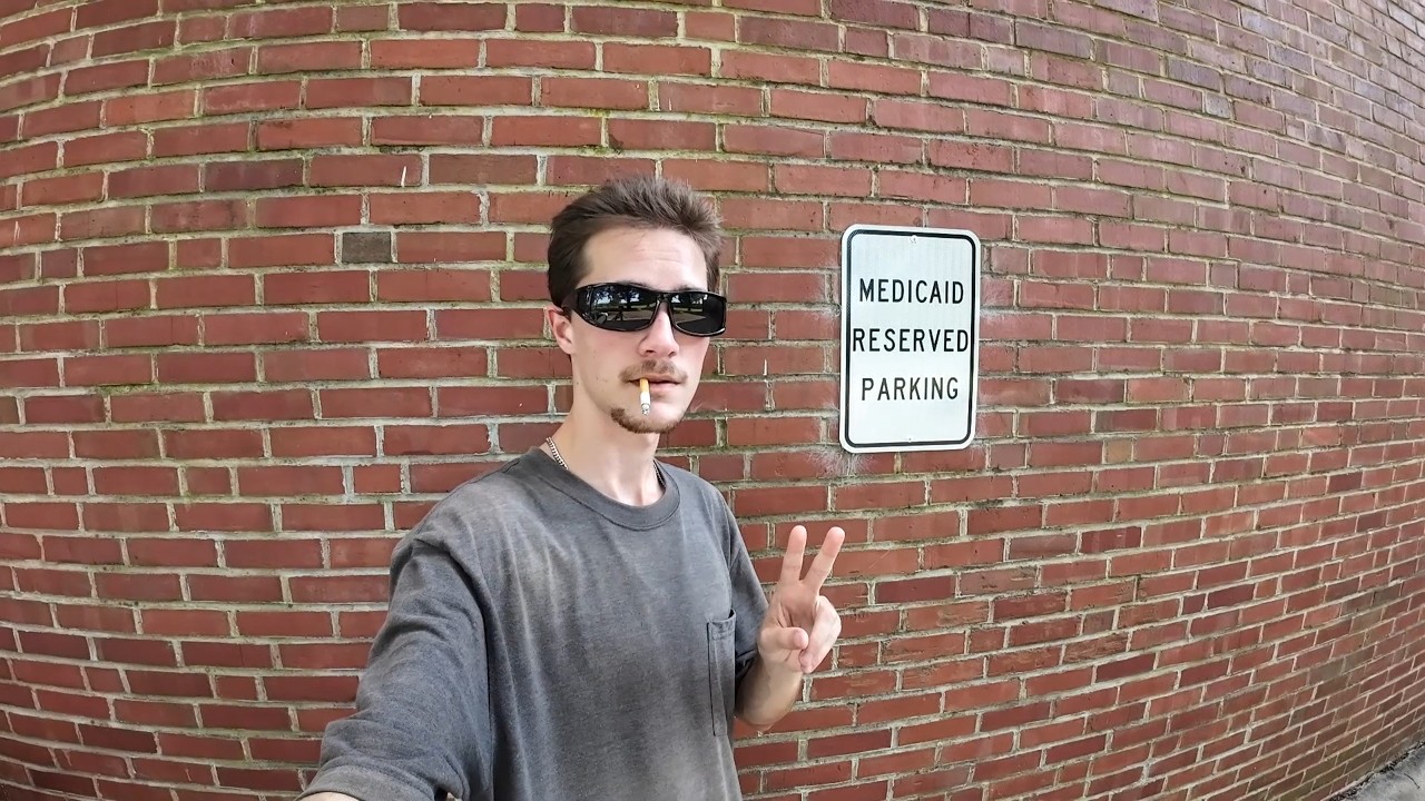 Smoking a Cigarette in a Medicaid Reserved Parking Space to Prevent People from Getting Medical Aid
