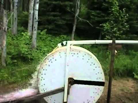 Water Wheel Made From Junk In Operation