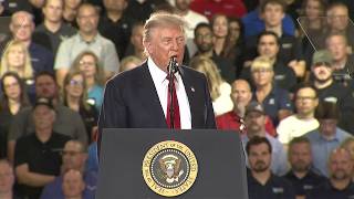 Trump rally interrupted by heckler, President responds 'he's a communist'