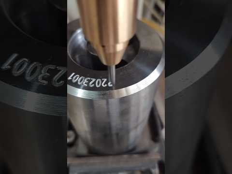 Workpiece coding machine