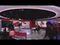 BBC World News Blooper - Floor manager runs through shot