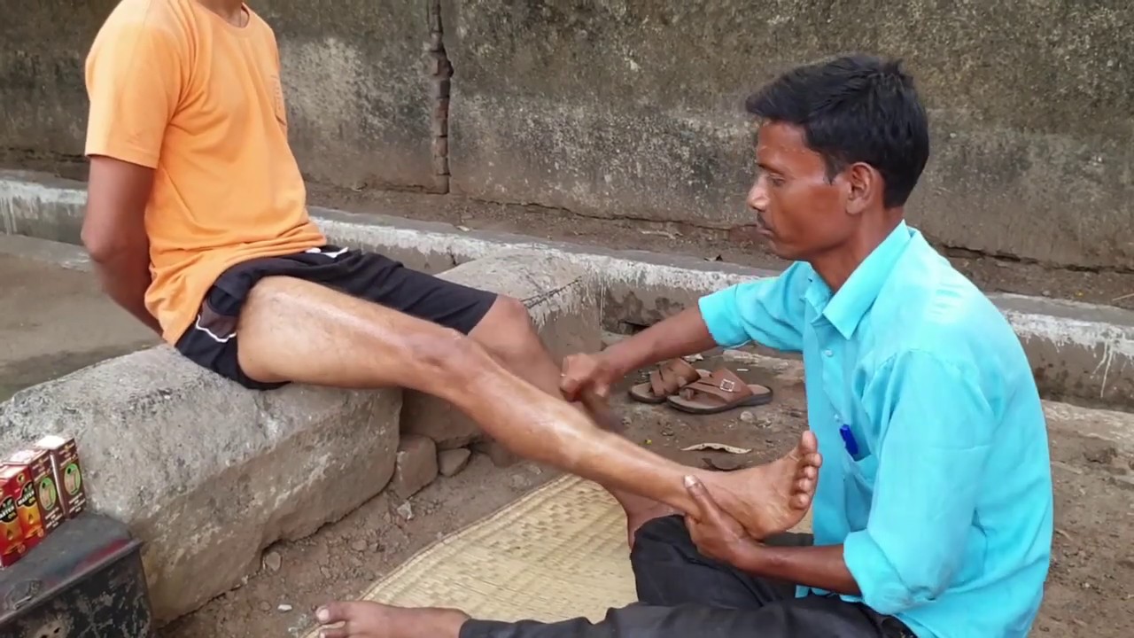 pain relief and smoking oil leg massage by new indian street barber asmr YouTube
