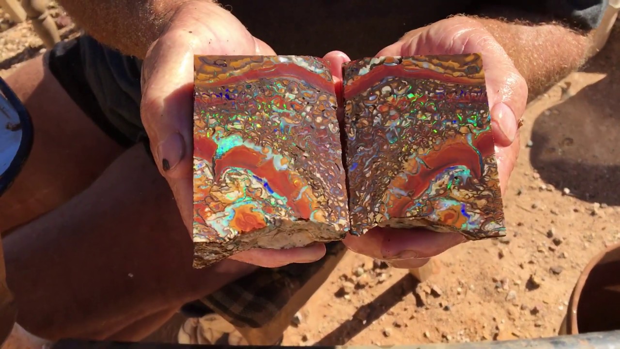 Slicing beautiful rough Koroit opal