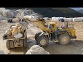 Huge Komatsu WA800 Wheel Loader Loading Caterpillar 775E Dumpers