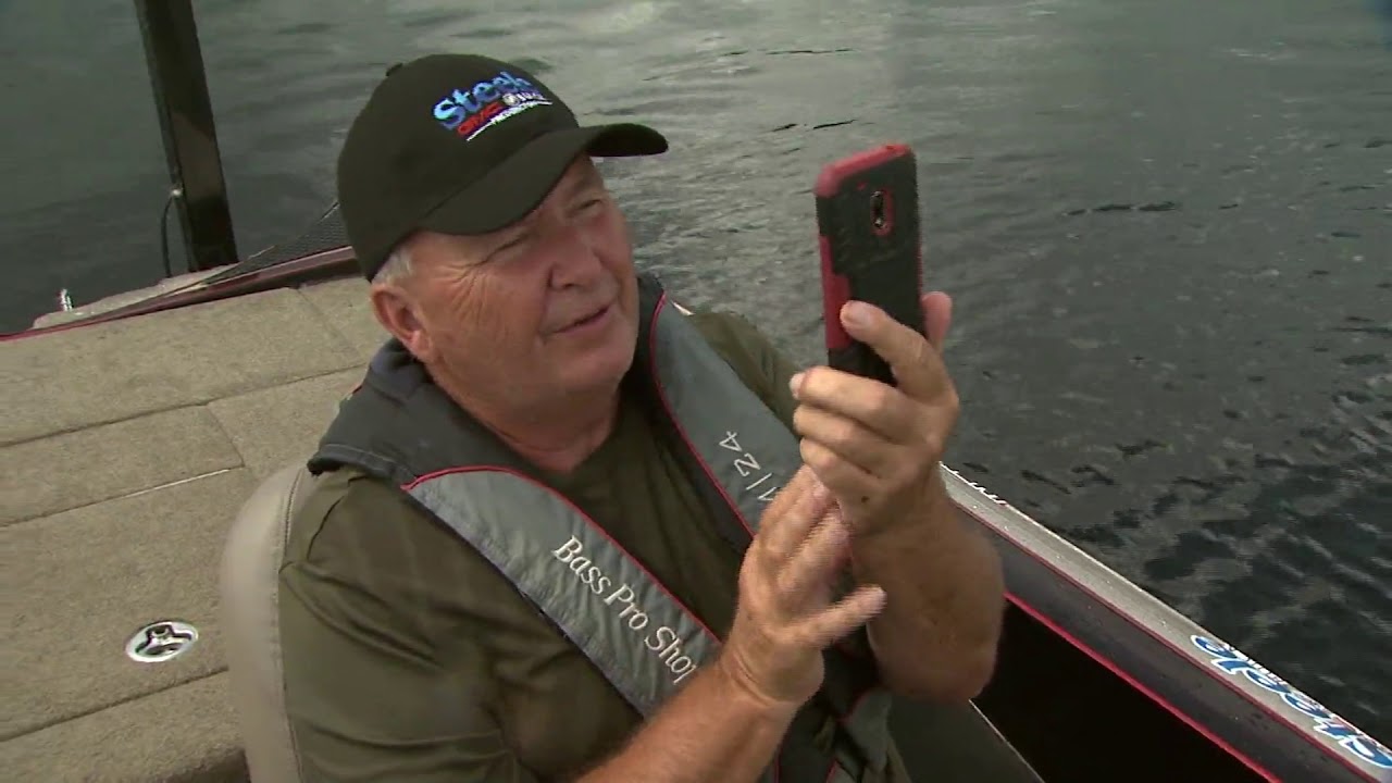 Backwater Casting Fishes for Smallies on a border lake between Maine and N.B.